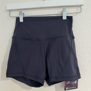 Born Primitive women’s “Your Go To Booty Shorts” in Navy